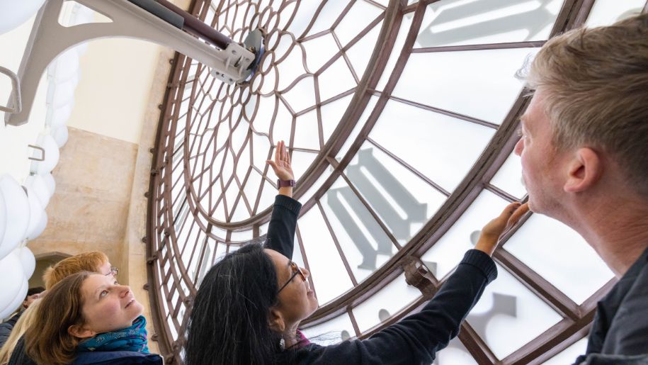 child and big ben clock face