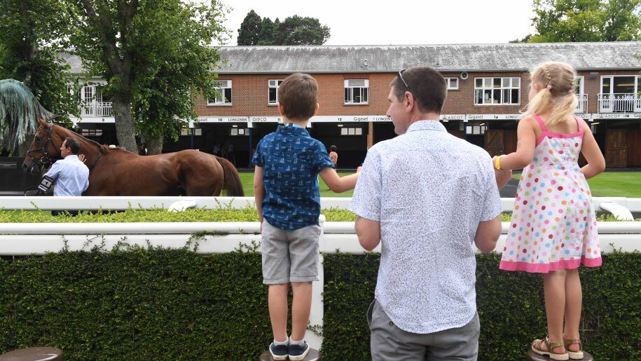 Father and children by the Parade Ring at Ascot