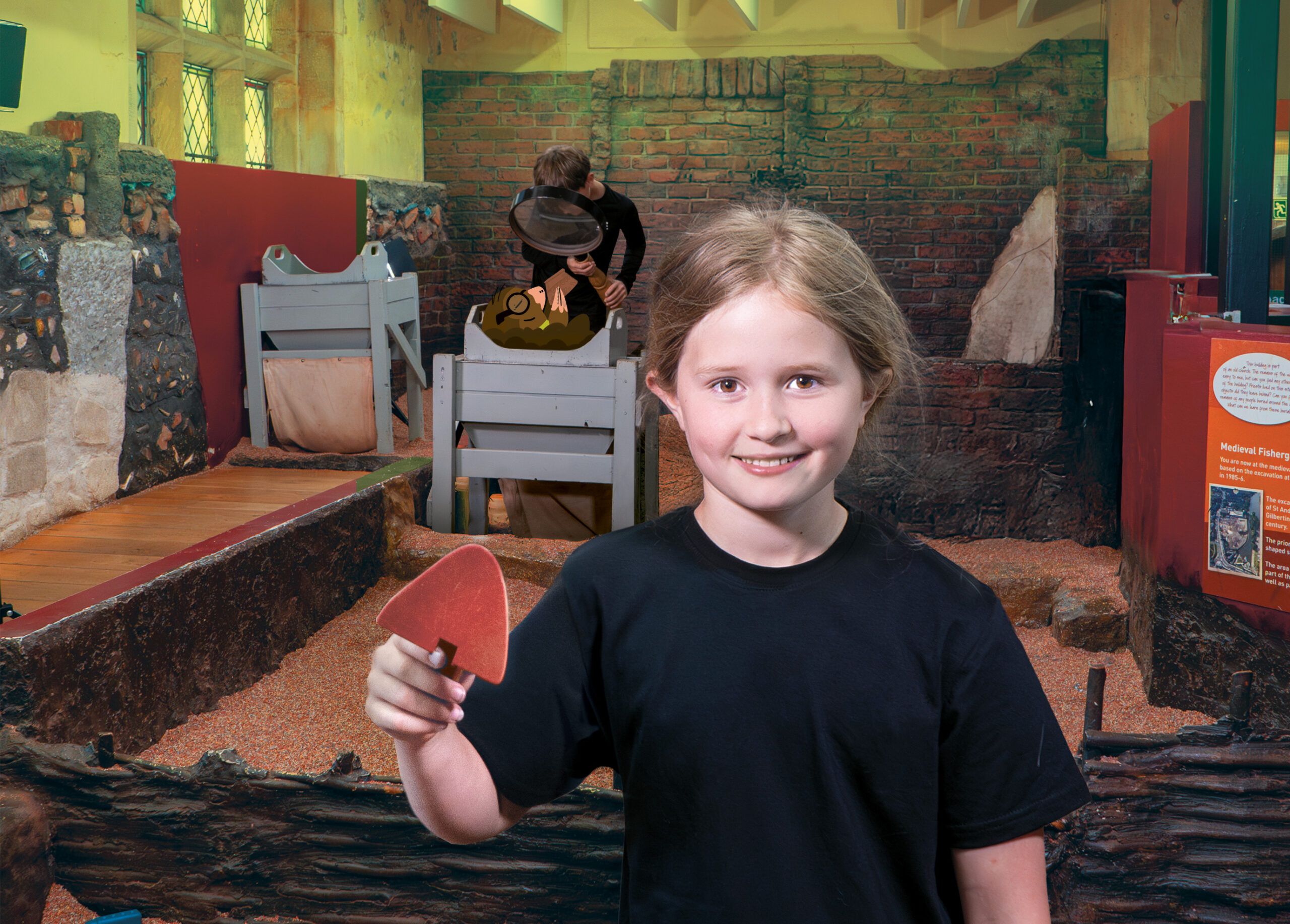 a young girl stands with a spade in front of the DIG exhibit at Jorvik