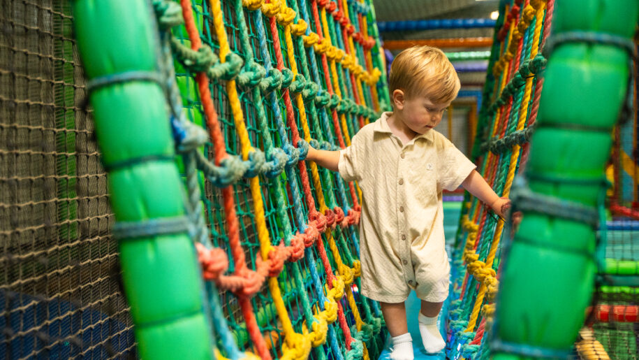child in rope bridge