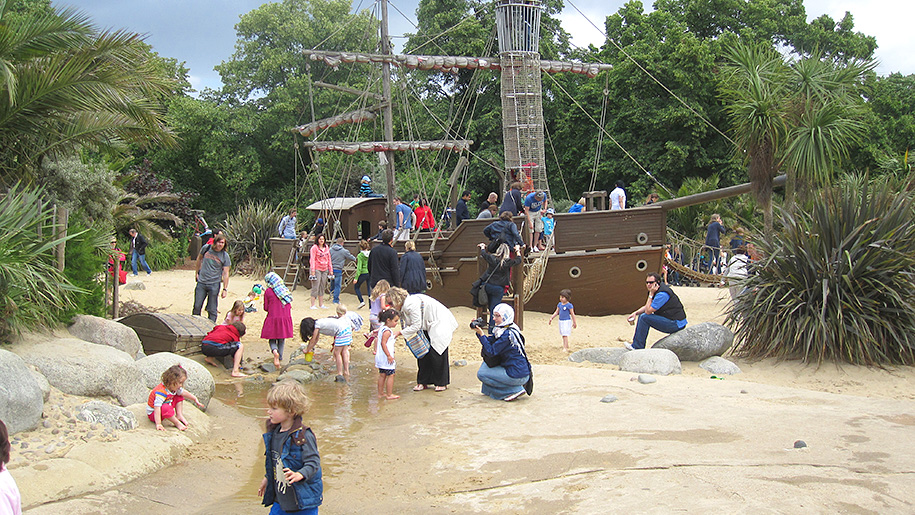 children playing by pirate boat