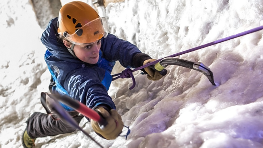 girl climbing ice wall