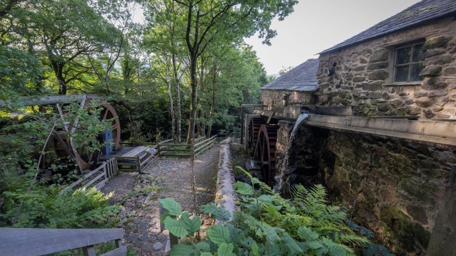 Three waterwheels in action at Eskdale Mill in Cumbria.