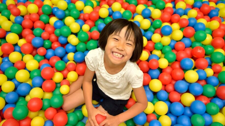 Child in ball pond at Gambado Chelsea