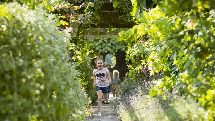 Children running at Hestercombe in Somerset.