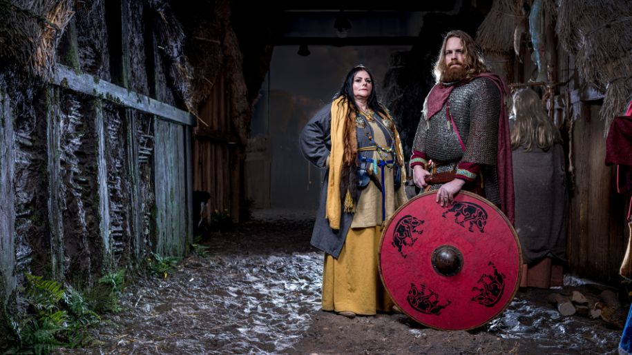 A man and women dressed as viking characters at JORVIK Viking Centre in Yorkshire