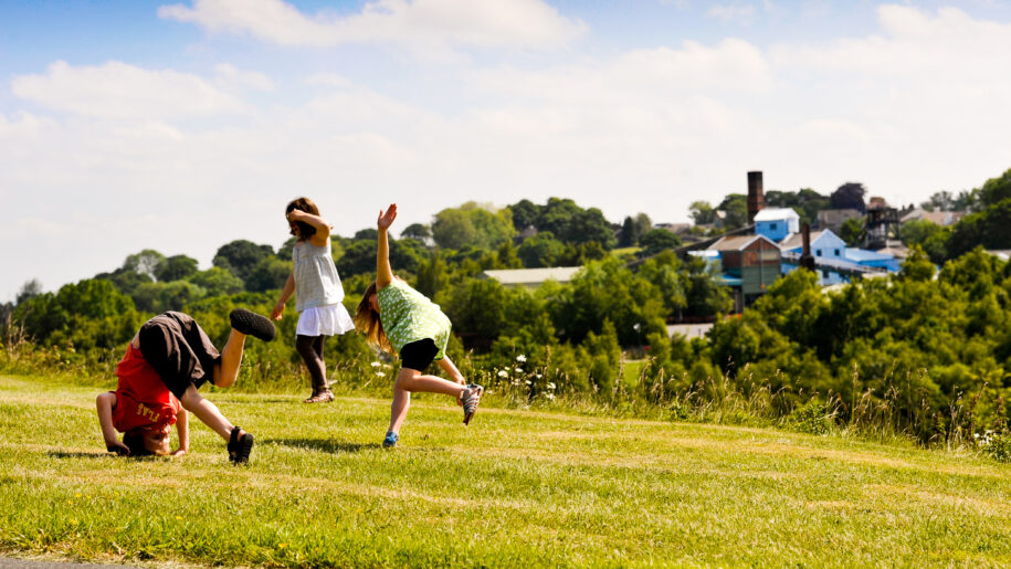 running kids in field