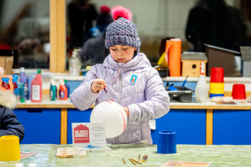 child doing crafts