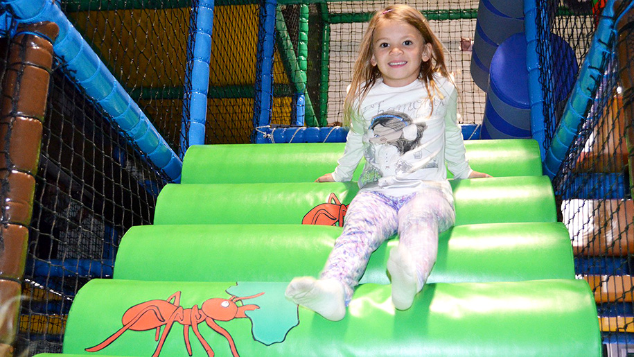 girl in soft play area