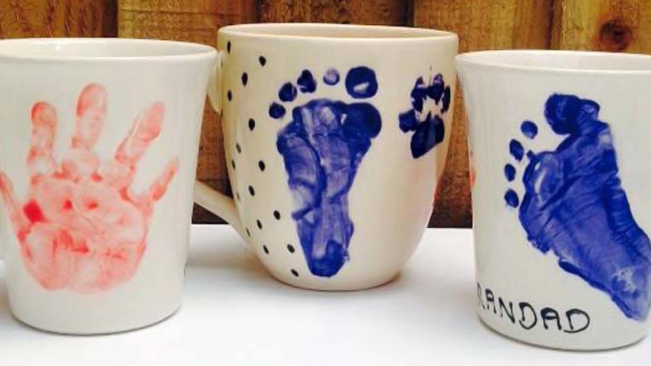 hand and foot prints on mugs