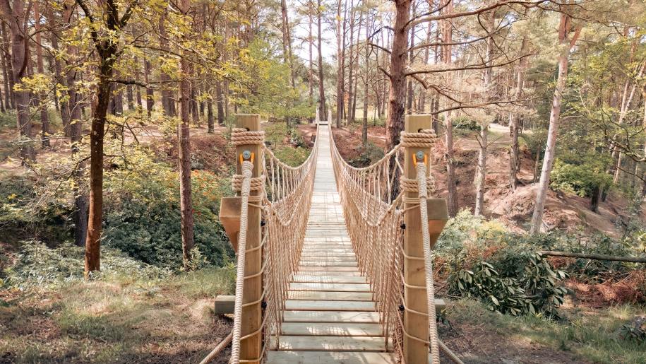 The rope bridge entrance to The Blue Pool in Dorset.