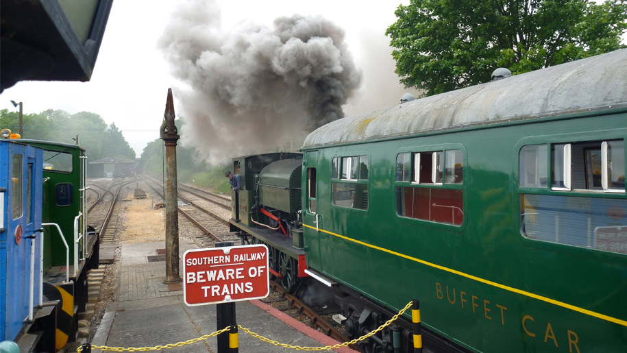 steam train leaving station