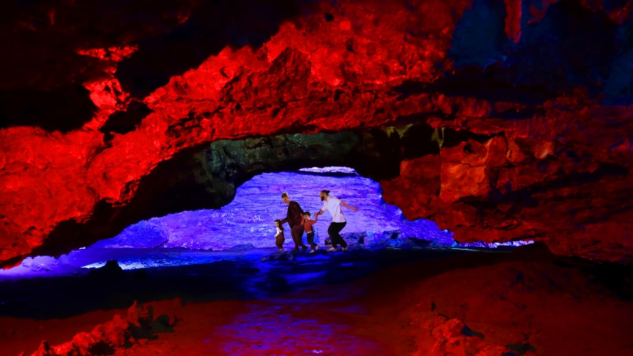 A family at Wookey Hole Caves in Somerset.