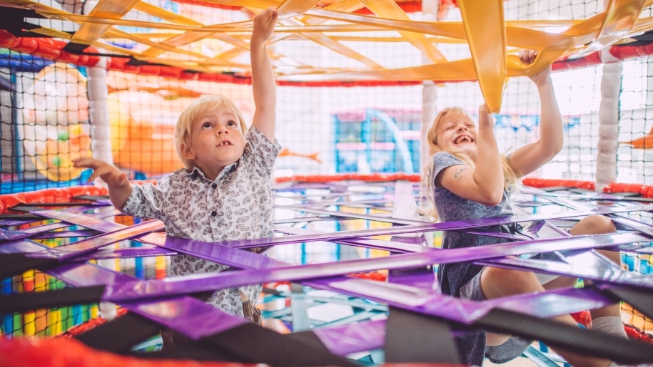 Children playing in soft play area