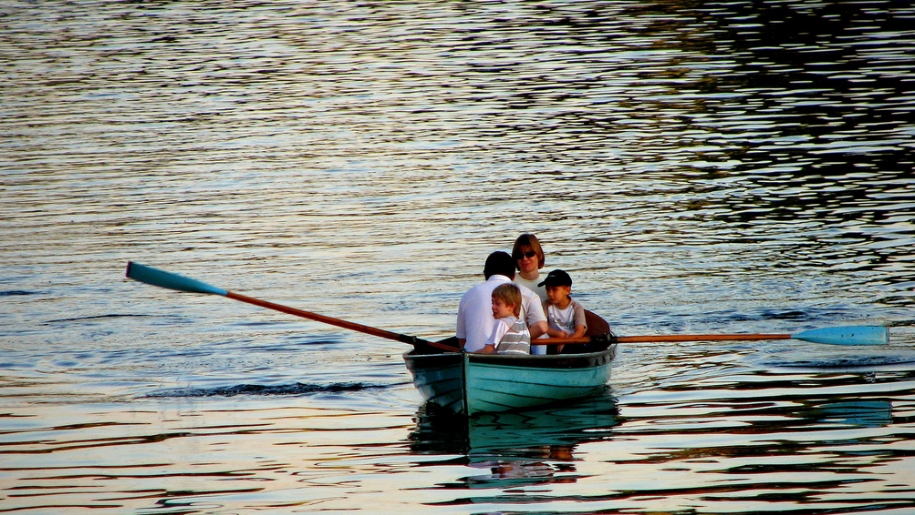 family in rowing boat