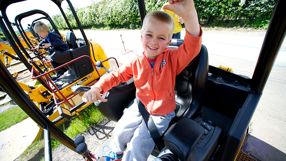 Diggerland child in tractor