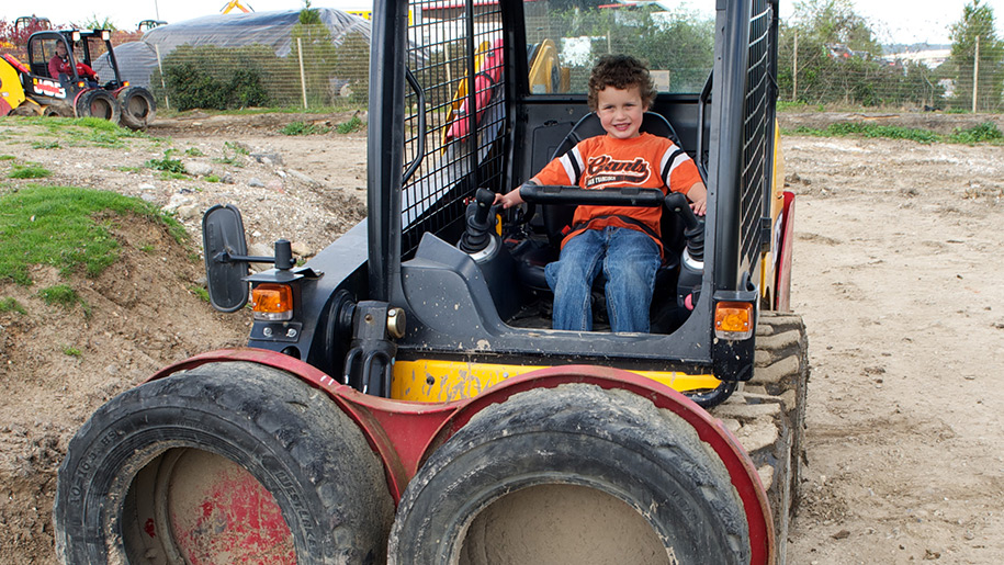 Diggerland child in tractor