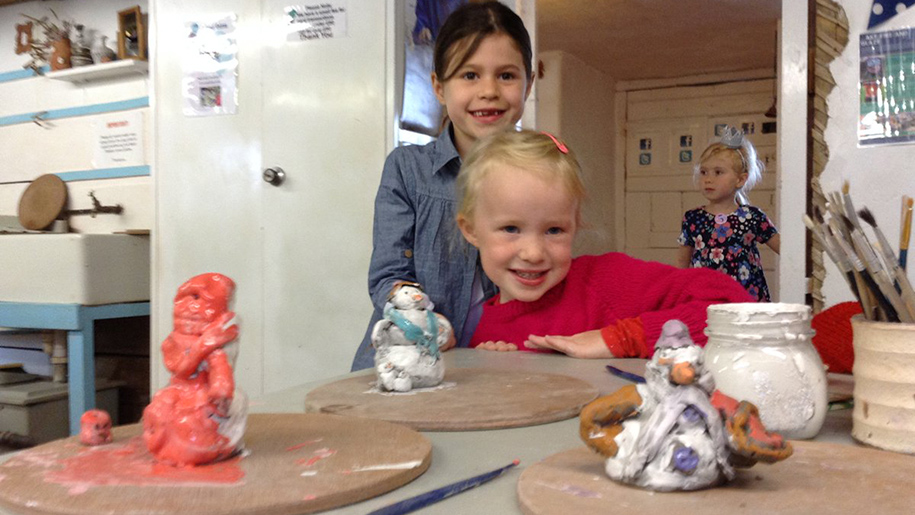 children making pottery