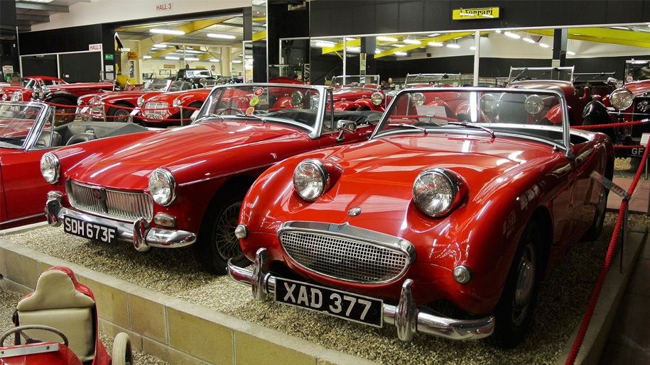 Red motor cars at Haynes Motor Museum.