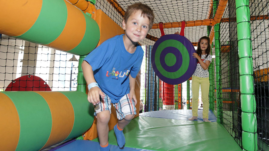 boy in soft play area