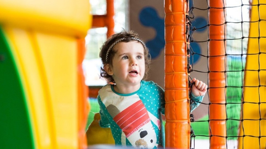 child in soft play area