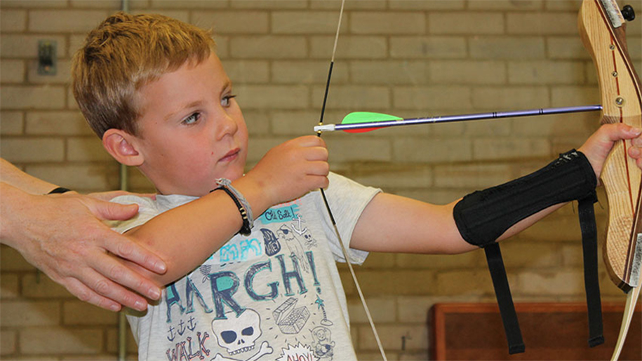 boy practising archery