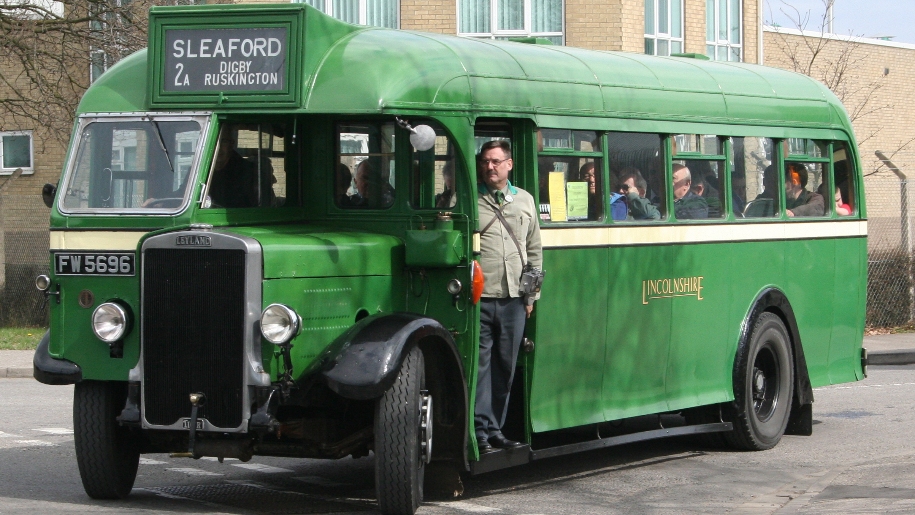 visitors on vintage bus