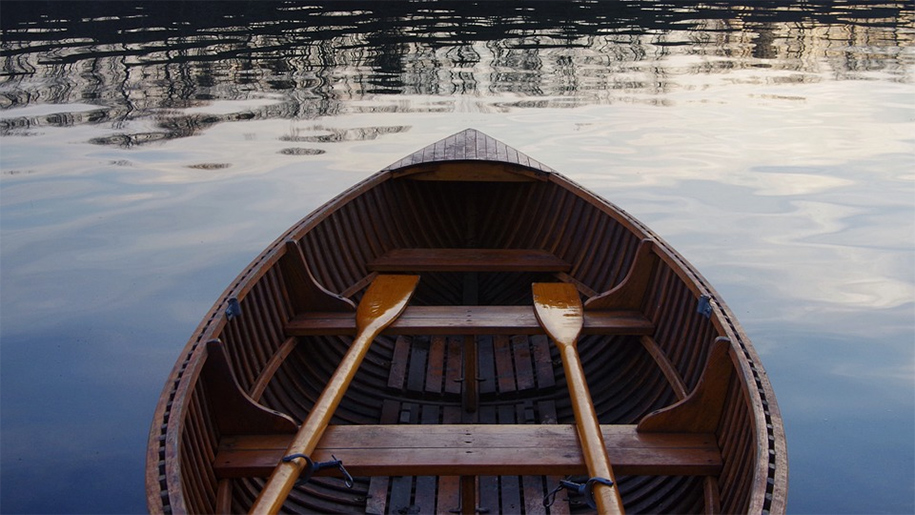 boat with paddles in boat