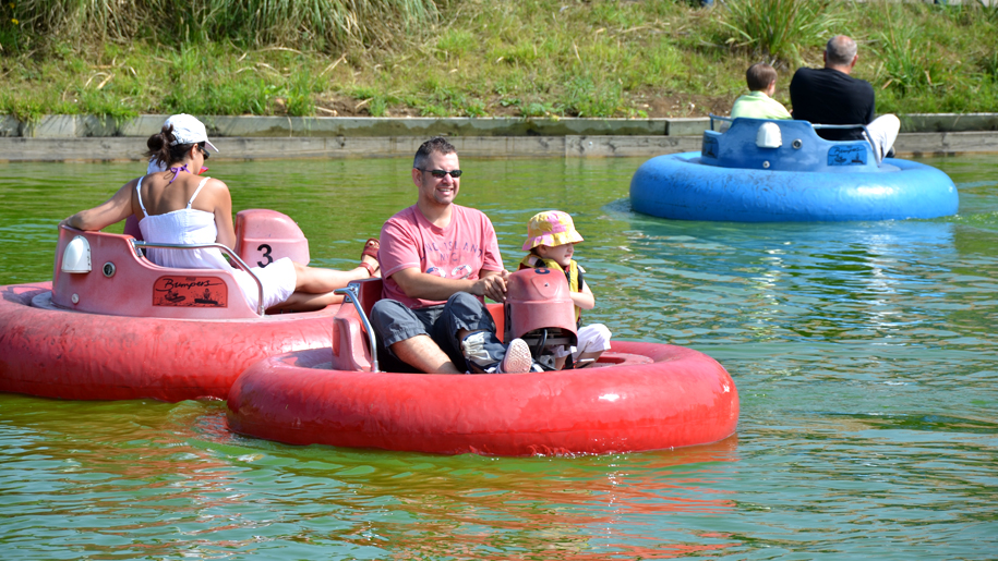 Twinlakes Theme Park child and parent on water inflatable