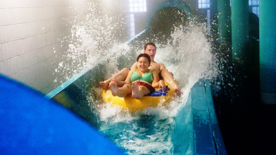 adults on water slide