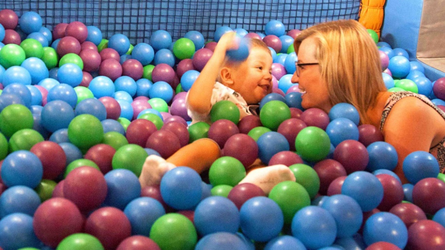 parent and child in ball put
