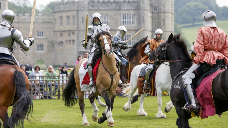 knights on horses jousting