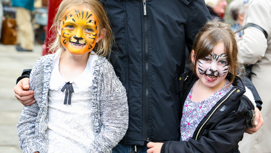 two girls with animal face paint