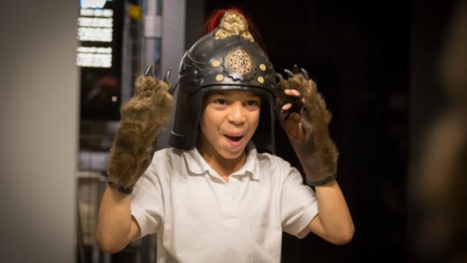 boy dressed up at royal shakespeare theatre