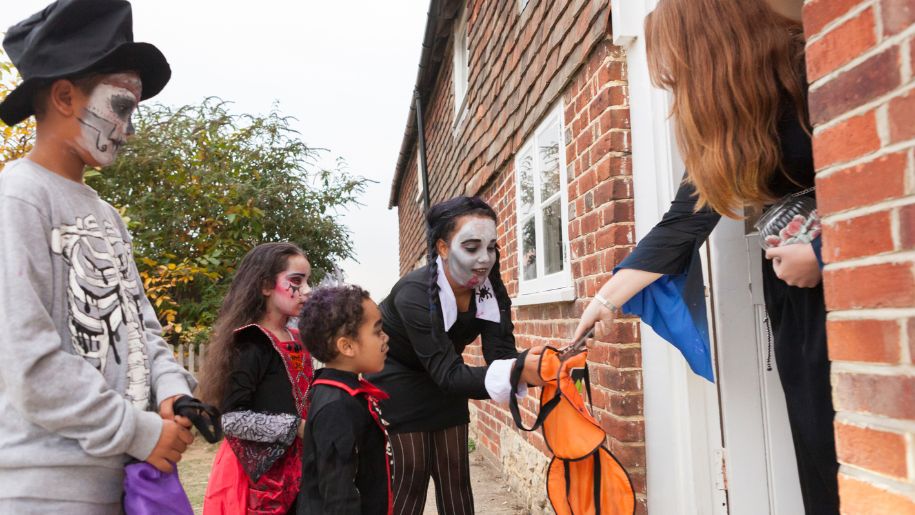 Children in Halloween costumes trick-or-treating at Kent Life