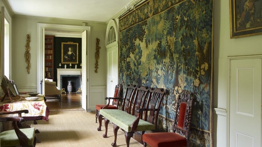 view of Long Hall with chairs and tapestry at Stonor Park