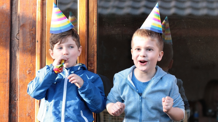 boys with party hats on