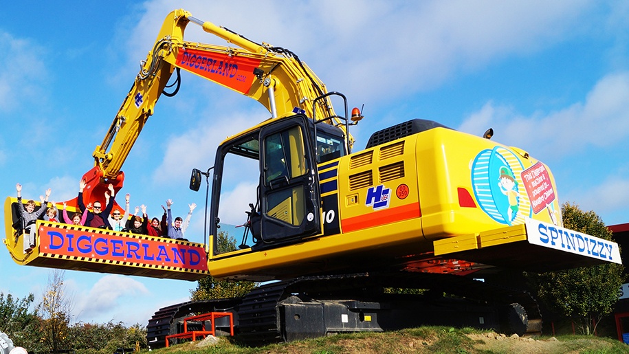 family on diggerland ride