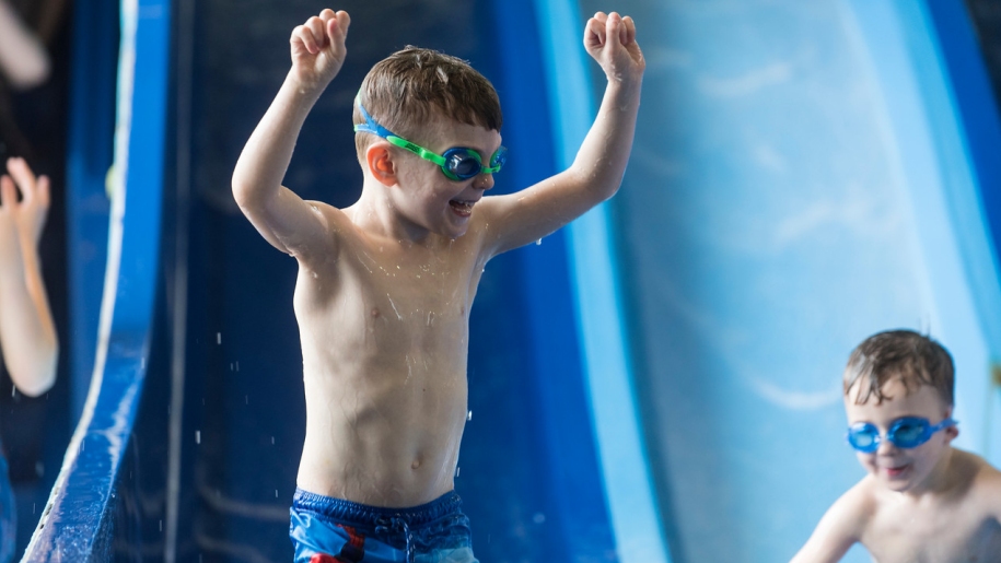 boy on water slide