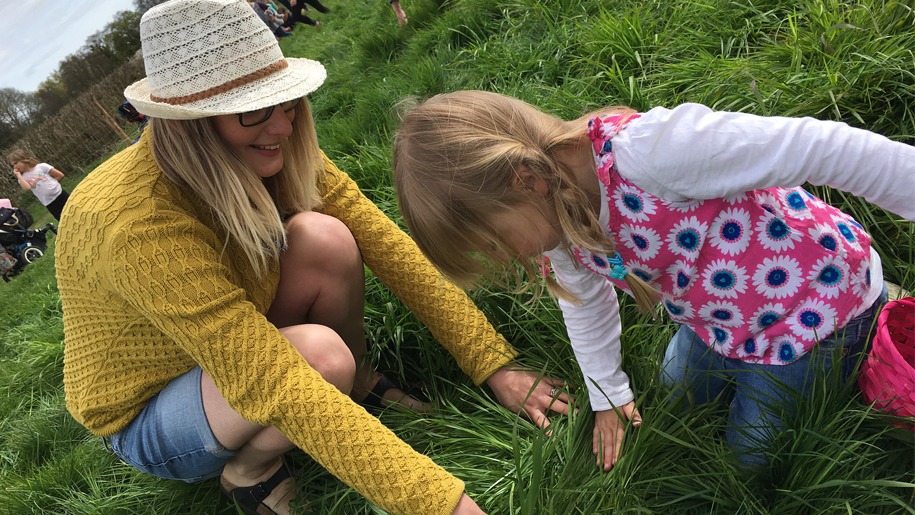 mother and daughter in the grass