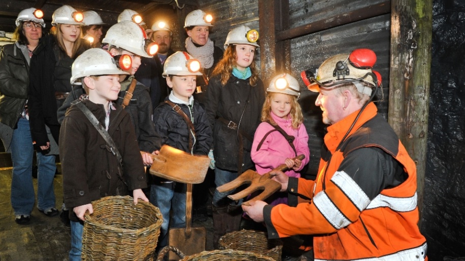 children learning in a mine