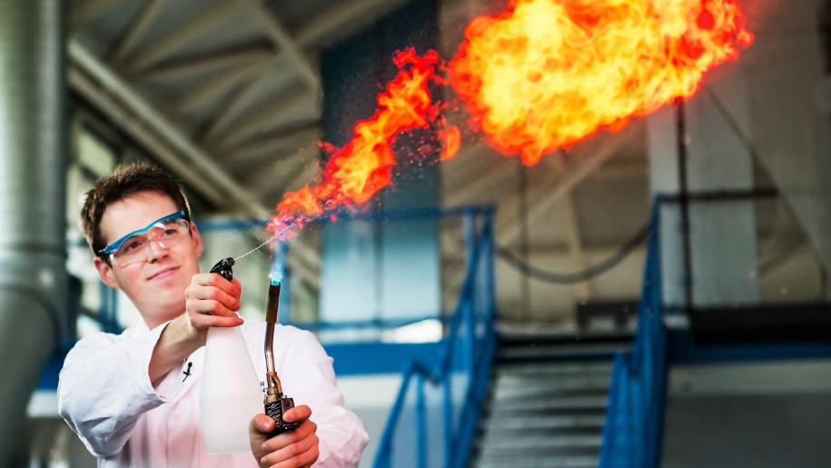 man with flames for science experiment