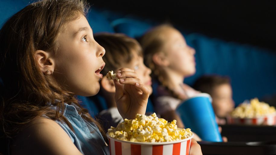 shutterstock girl at cinema image