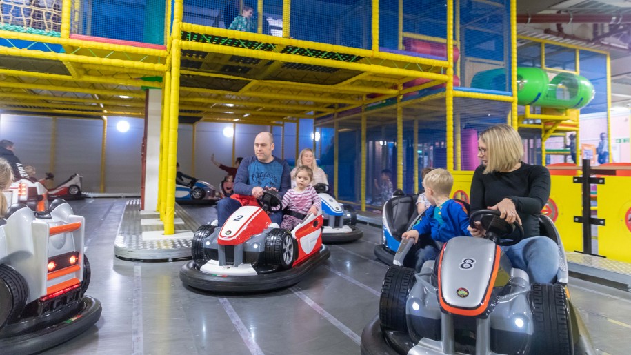 Families on the dodgems at 360 Play family entertainment centre.