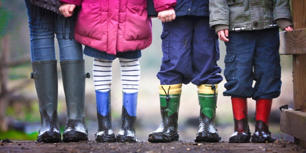 kids legs with wellington boots