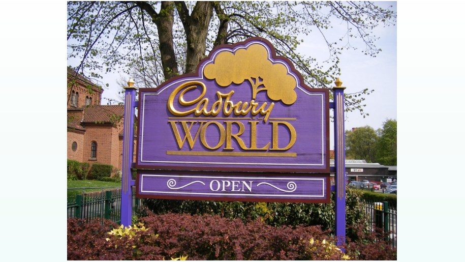 The purple and gold sign of Cadbury World in Birmingham.