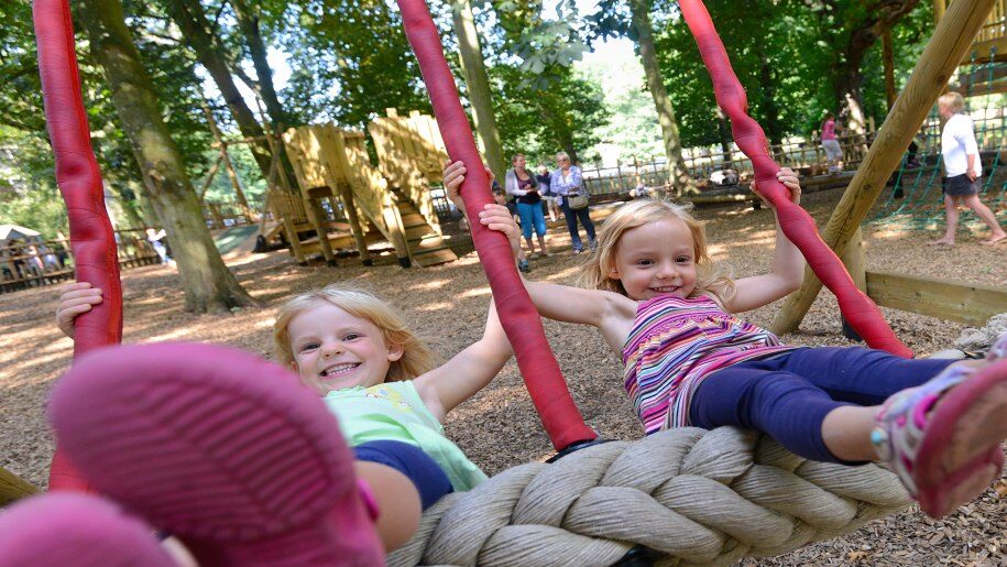 Holkham girls on swings 915x515