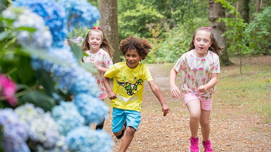 kids running in gardens Exbury Gardens