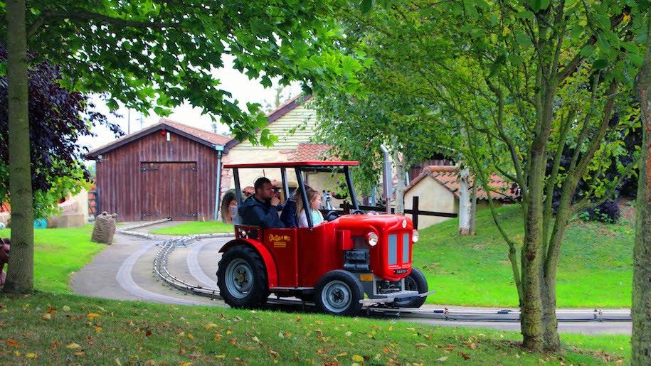 Family on a tractor ride at Sundown Adventureland