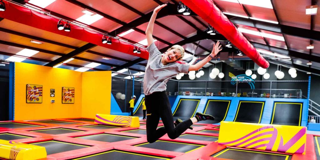 girl bouncing on trampoline Red Kangaroo